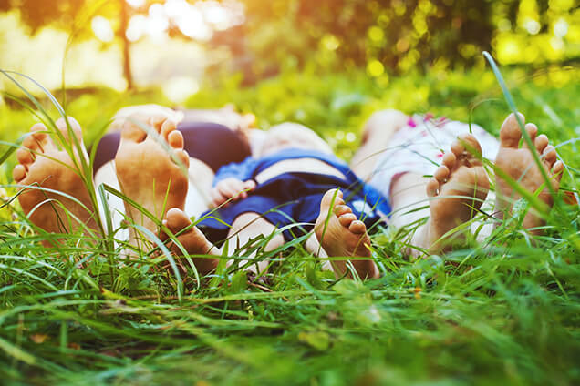 Family Laying in the Grass