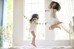 Girls Jumping on the Bed